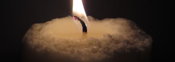 Deriving 1 Hz from Candle Flame Oscillations